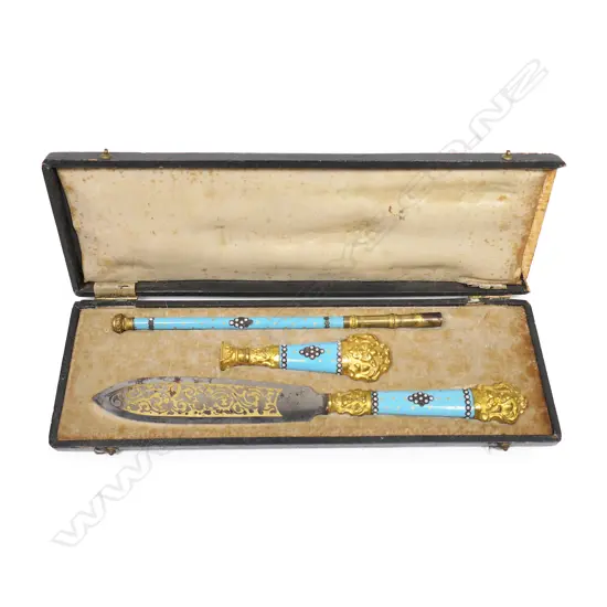 A 19thC French enamel and gilded brass writing set,