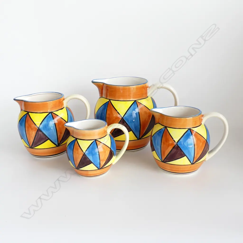 4 REPRODUCTION GRADUATING CLARICE CLIFF BIZARRE JUGS H.185mm Image 1++