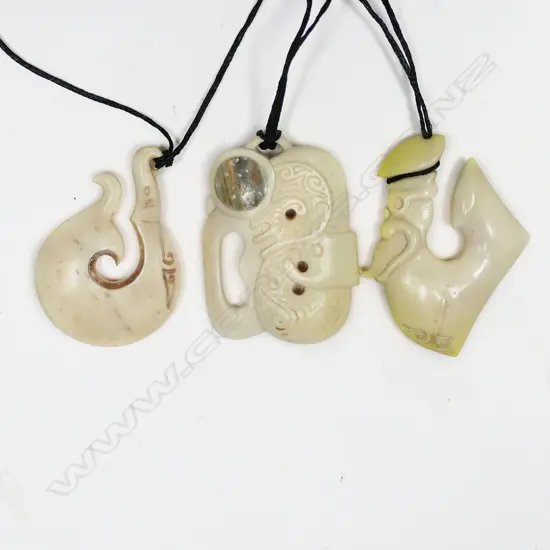 3 PAUL GYDE CARVED BONE & PENDANTS, 2 HEI MATAU & 1 OTHER, L.50-55mm, IN FITTED WOODEN BOXES
