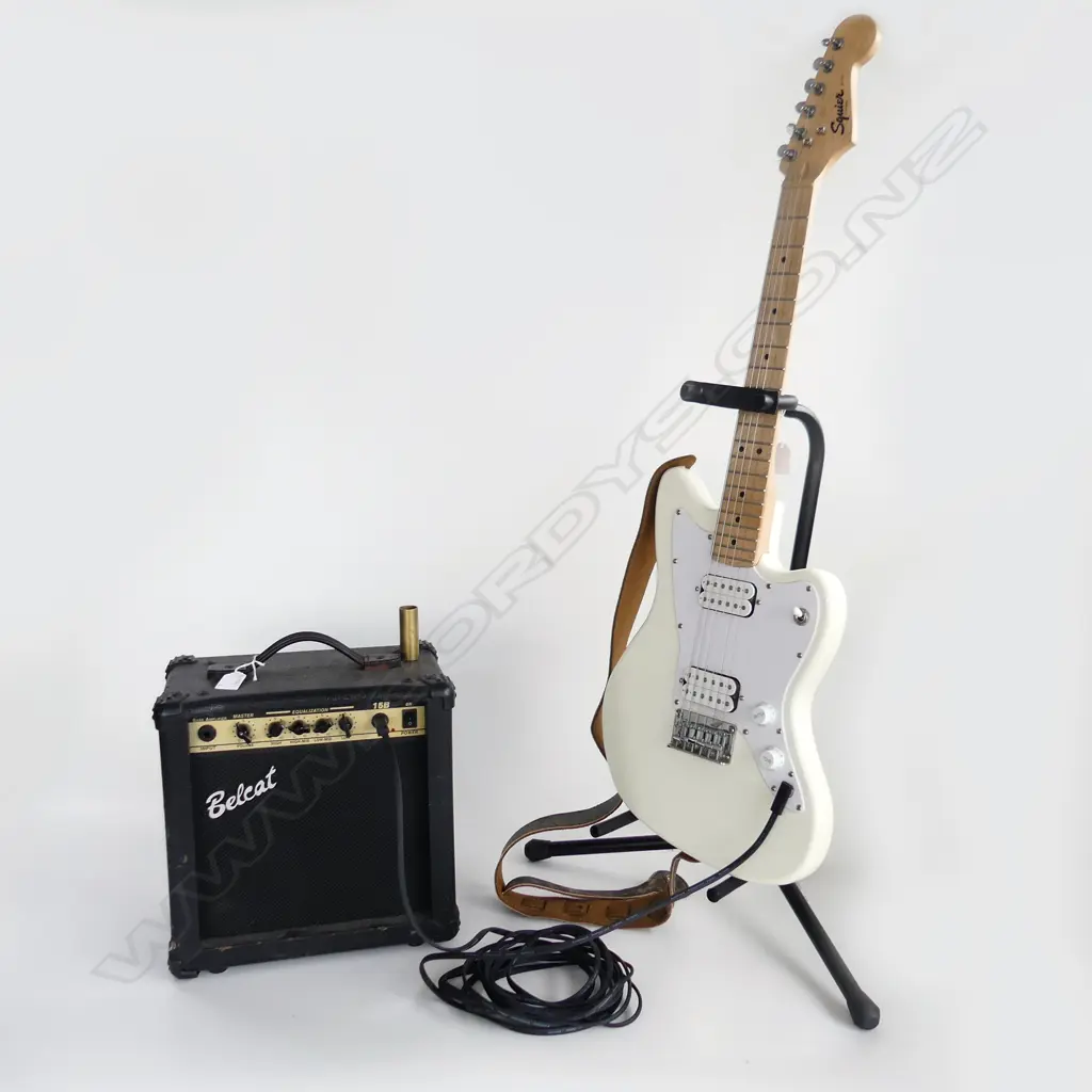 SQUIER MINI JAZZ MASTER ELECTRIC GUITAR, CASED w. STAND, LEATHER STRAP, LEAD, SLIDE BAR & BELCAT AMP Image 1++