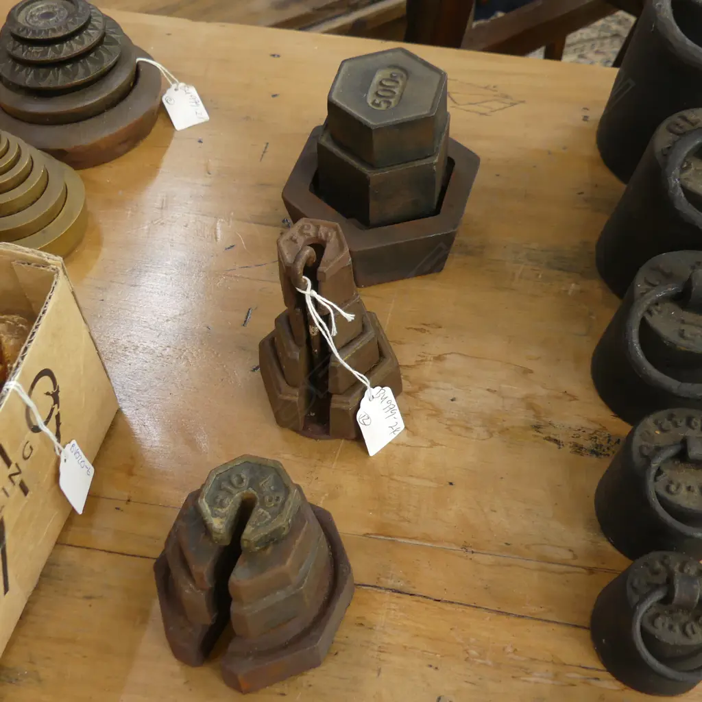 12 CAST IRON WEIGHTS ALL EITHER HEXAGONAL HEPTAGONAL OR PENTAGONAL  Image 1++