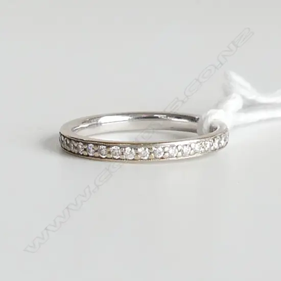 18CT DIAMOND SET ETERNITY RING, 2.1GMS, SIZE K, APPROX 0.50CT DIAMONDS