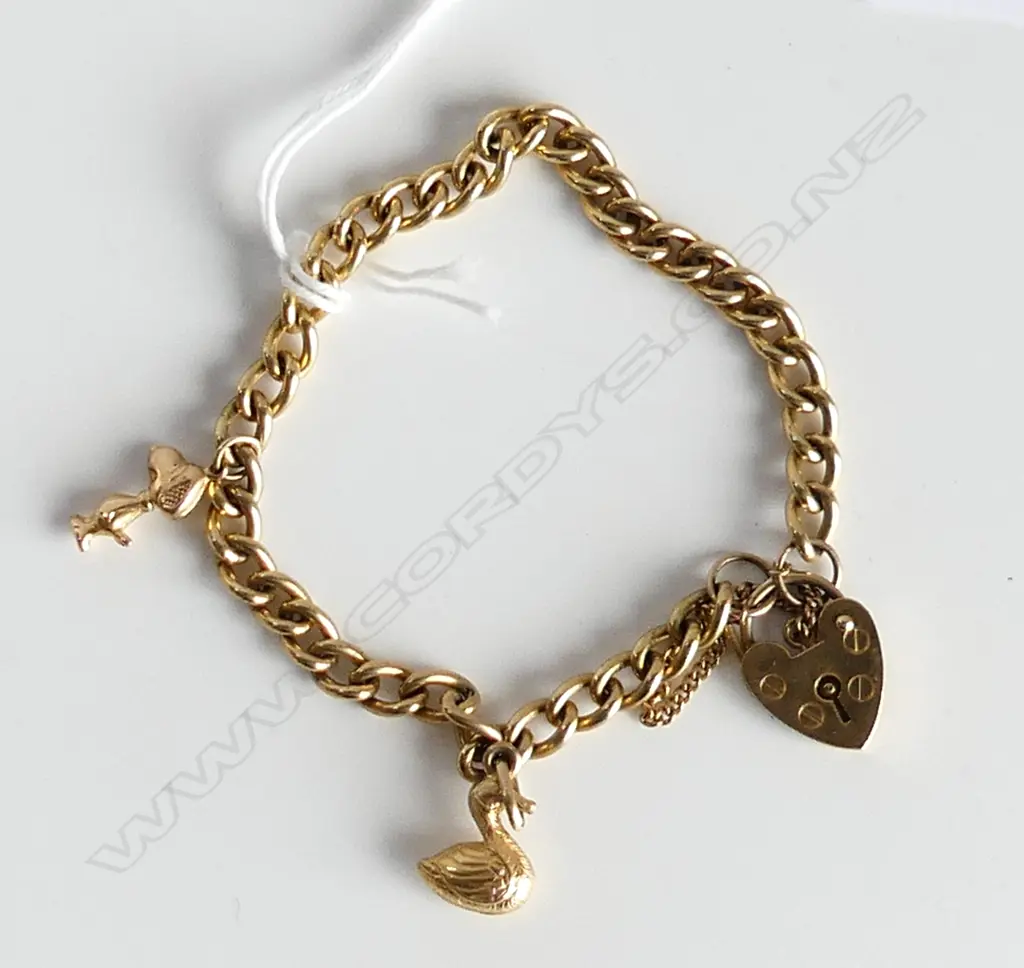 9CT SOLID GOLD CURB LINK CHARM BRACELET 16gms Image 1++
