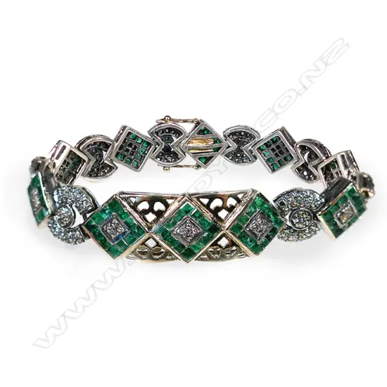 SILVER AND GOLD DIAMOND AND EMERALD BRACELET (one emerald missing)
