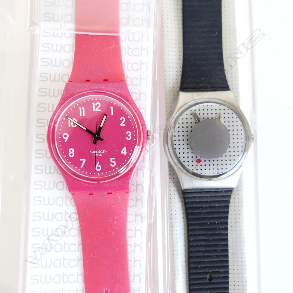 2 SWATCH WATCHES, IN CASES, 1 RED STRAP, 1 BLACK Image 1++