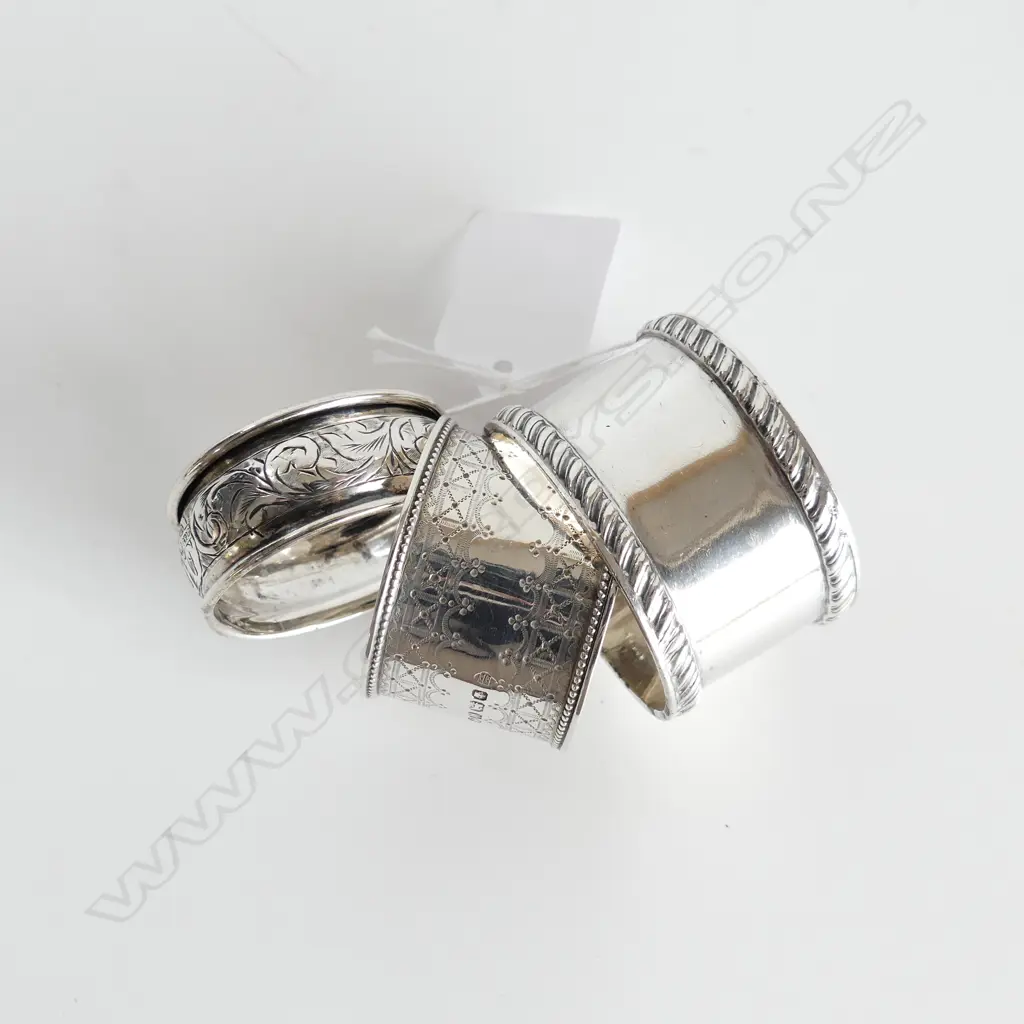 3 ASST STG SILVER NAPKIN RINGS 68GMS  Image 1++