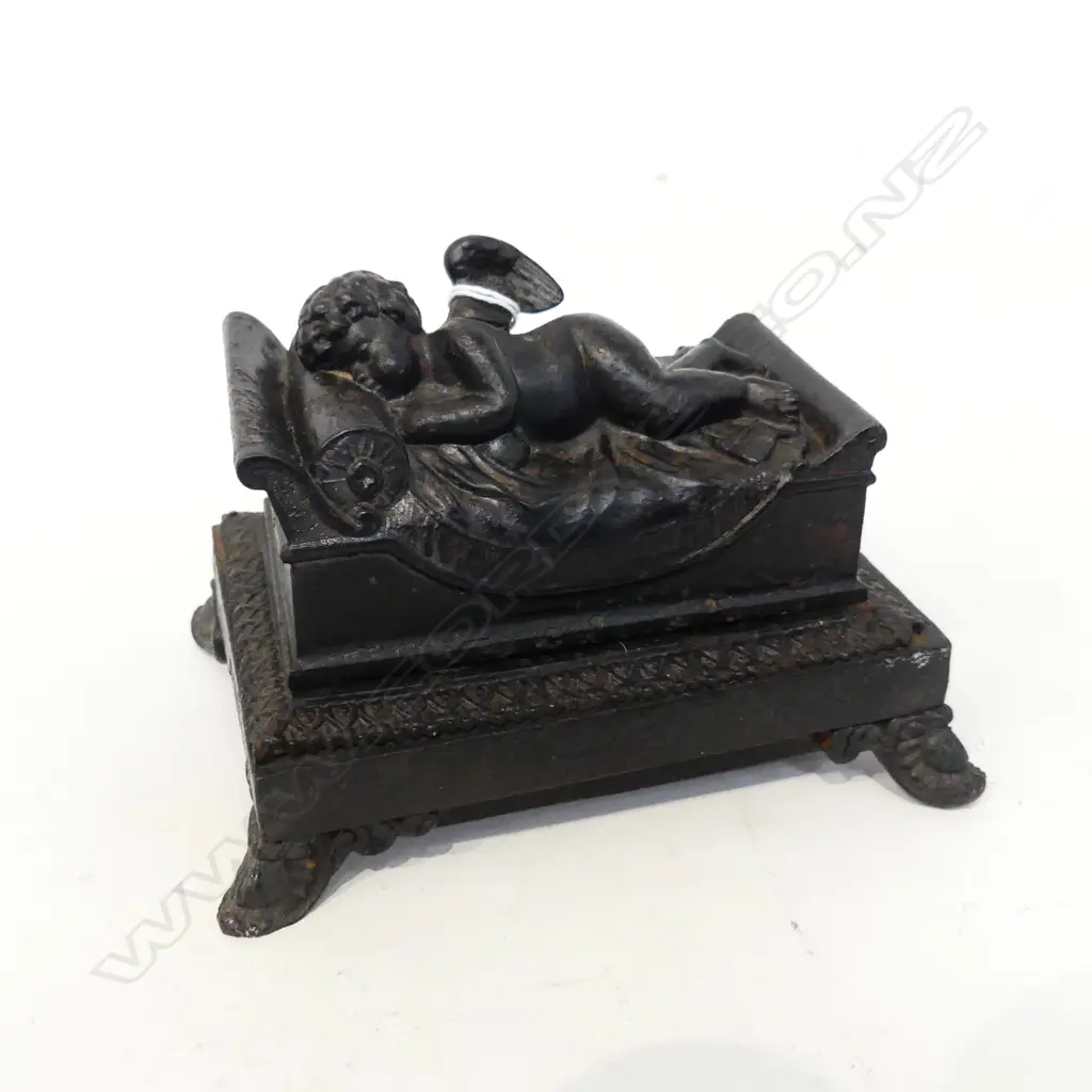 VICTORIAN CAST IRON LIDDED INKWELL; ANGEL IN BED W.150mm Image 1++