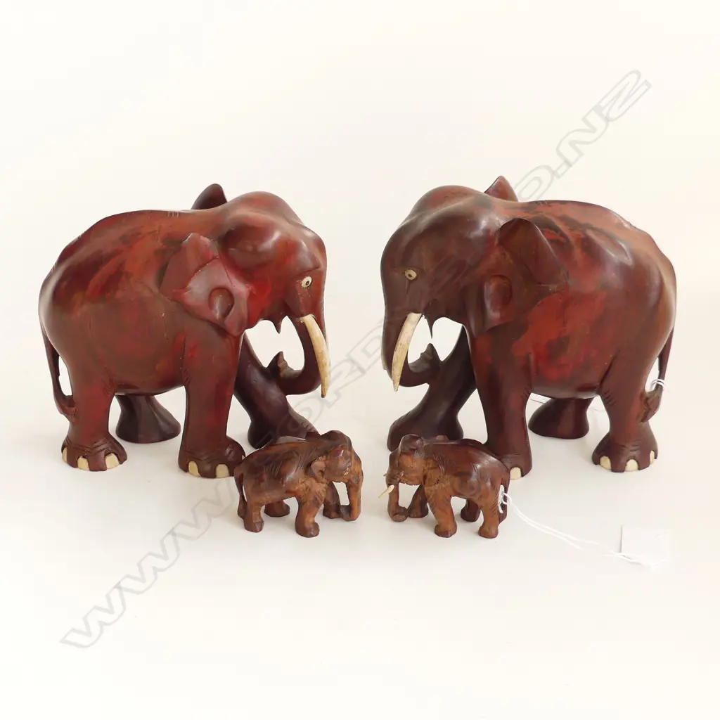 2 HARDWOOD CARVED ELEPHANTS WITH BONE TUSKS WITH 2 SMALLER ONE WITHOUT TUSKS H 160 MM Image 1++
