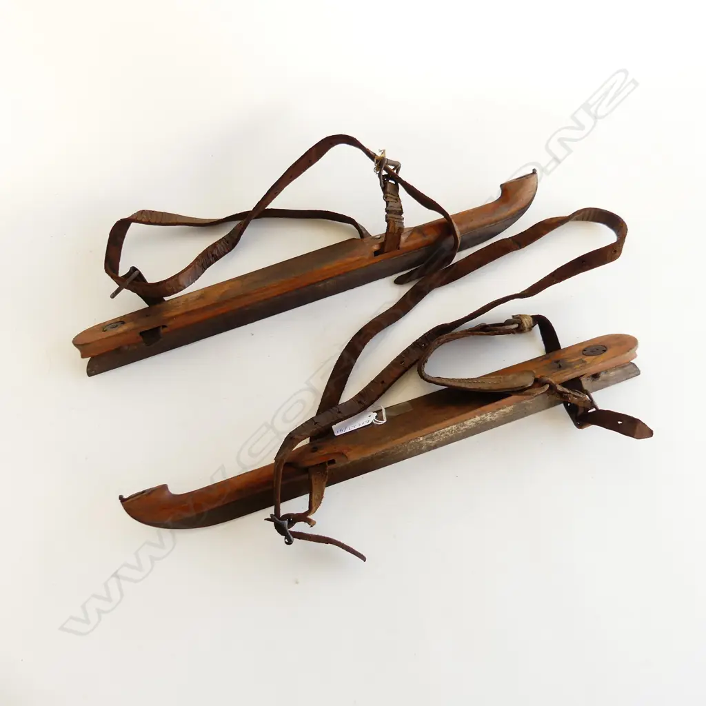 PAIR OF ANTIQUE WOODEN ICE SKATES WITH STEEL BLADES AND LEATHER FITTINGS STAMPED 2160 L. 410mm Image 1++