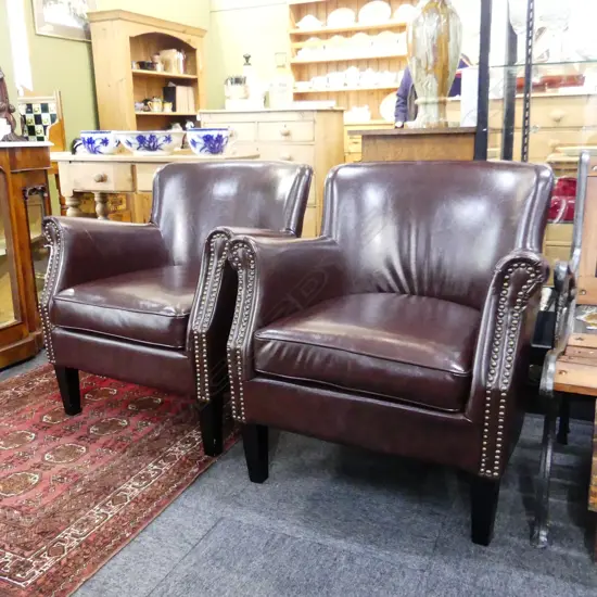 PR BROWN VINYL CLUB CHAIRS