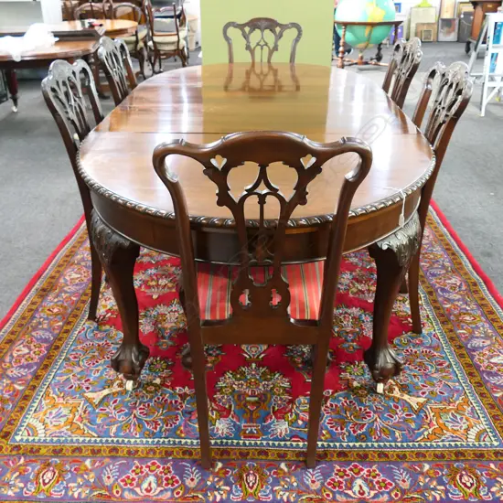 CHIPPENDALE-STYLE DINING TABLE (TWO ADDIT. LEAVES) & 6 CHAIRS