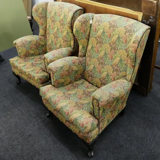 PAIR OF WING BACK ARMCHAIRS