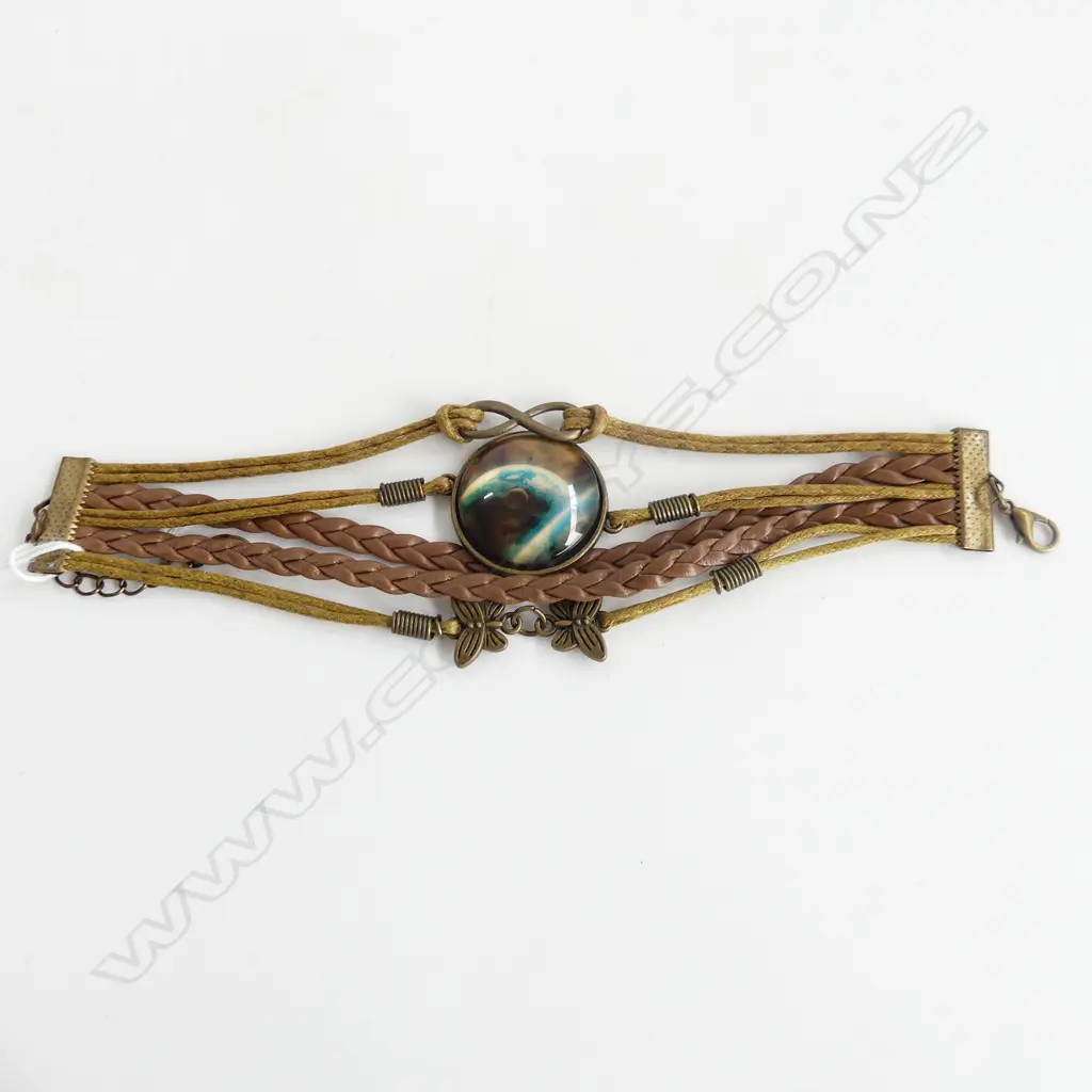 UNUSUAL LEATHER & MOON PICTURE BRACELET Image 1++