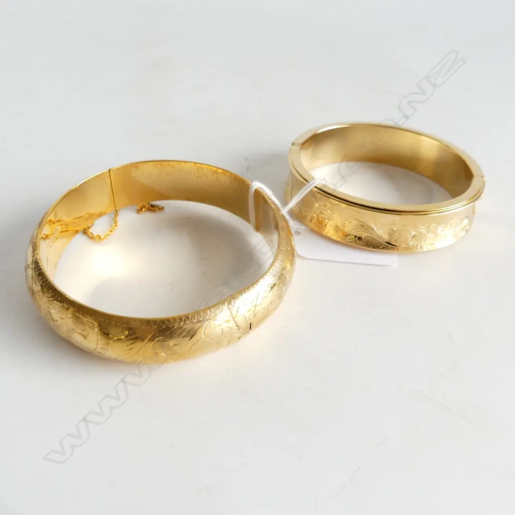 TWO GOLD PLATED BRACELETS WITH ENGRAVED PATTERN Image 1++