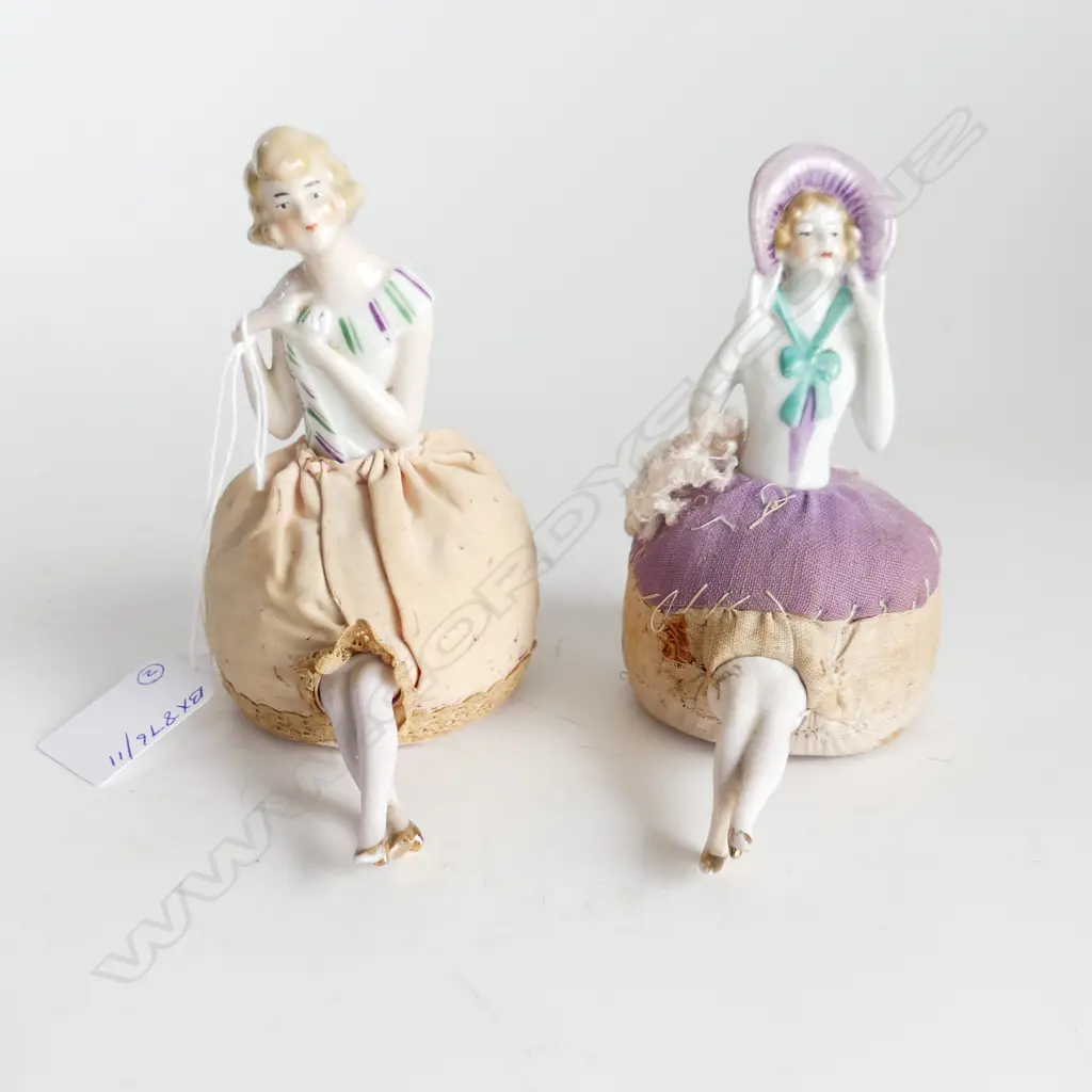 TWO ANTIQUE HALF DOLL PIN CUSHIONS WITH LEGS – ONE WITH BONNET, ONE WITH PURPLE & GREEN COLLAR H. 120mm Image 1++