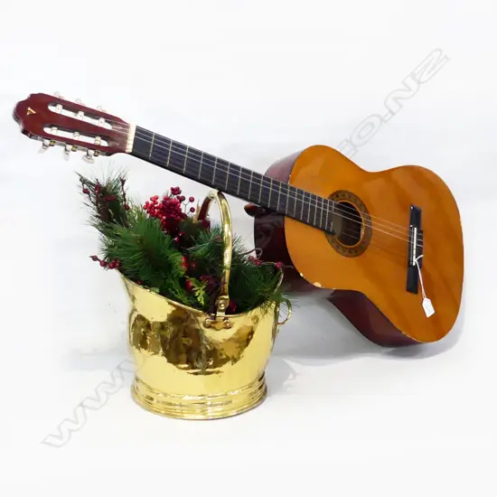 VALENCIA  ACOUSTIC GUITAR AND REPRO BRASS HELMET SCUTTLE WITH XMAS DECORATIONS INSIDE.