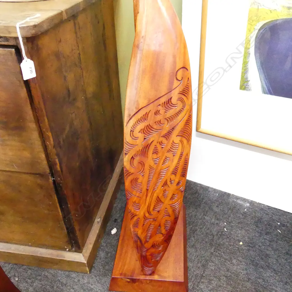WAKA HOE; MAORI CARVED WOODEN ORNAMENTAL CANOE PADDLE L.1520mm ON STAND H.870mm Image 1++