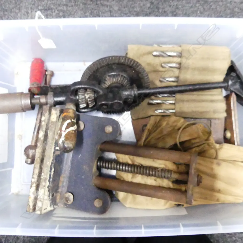 BOX OF HEAVY TOOLS – CLAMP, HAND DRILL, TWO ROLLS OF DRILL BITS, PLANE BLADES Image 1++