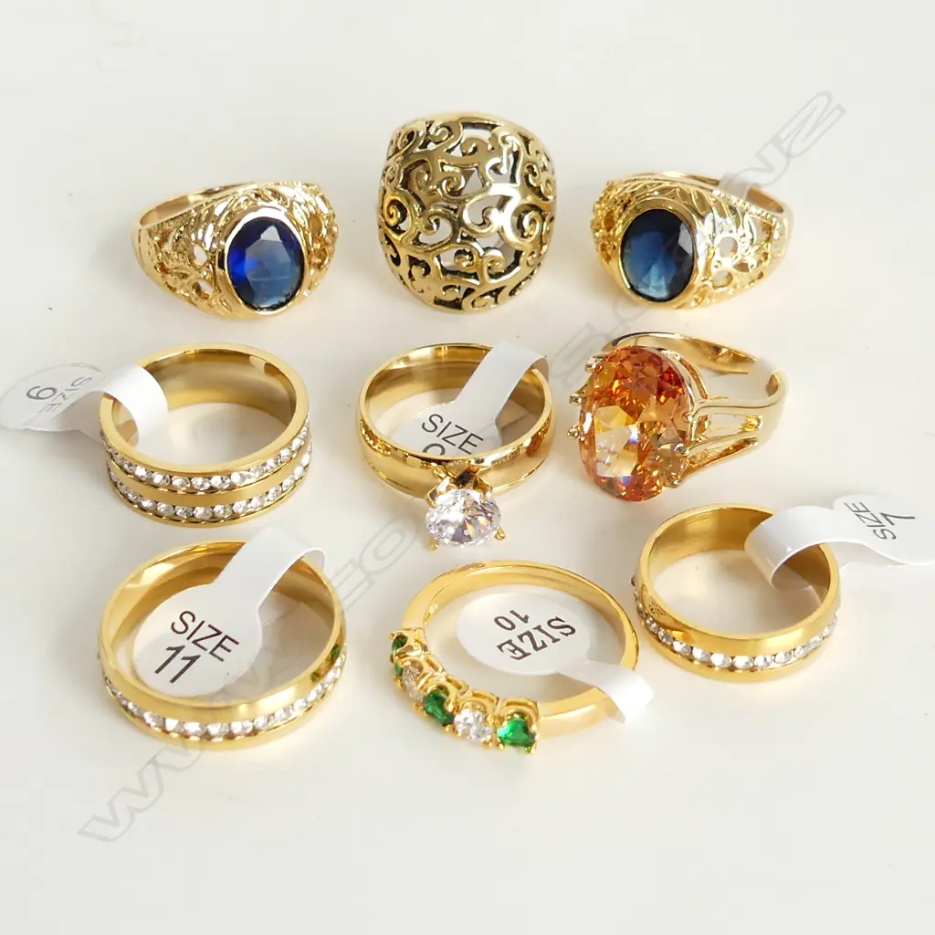 9 GOLD TONE COSTUME RINGS Image 1++