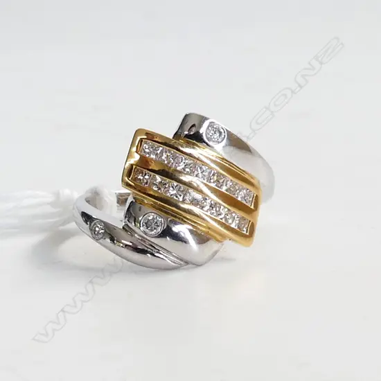 18CT WHITE & YELLOW GOLD  DIAMOND MULTI STONE RING; 3 DIAMOND CUT & 14 PRINCESS CUT, WITH VALUAITON