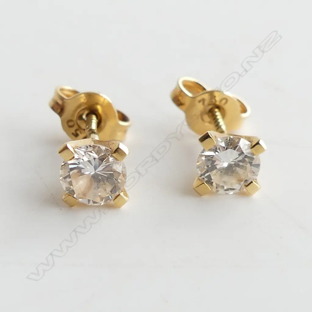 PAIR 18CT GOLD AND DIAMOND STUD EARRINGS - (0.33ct each earring) TDW 0.66CT Image 1++