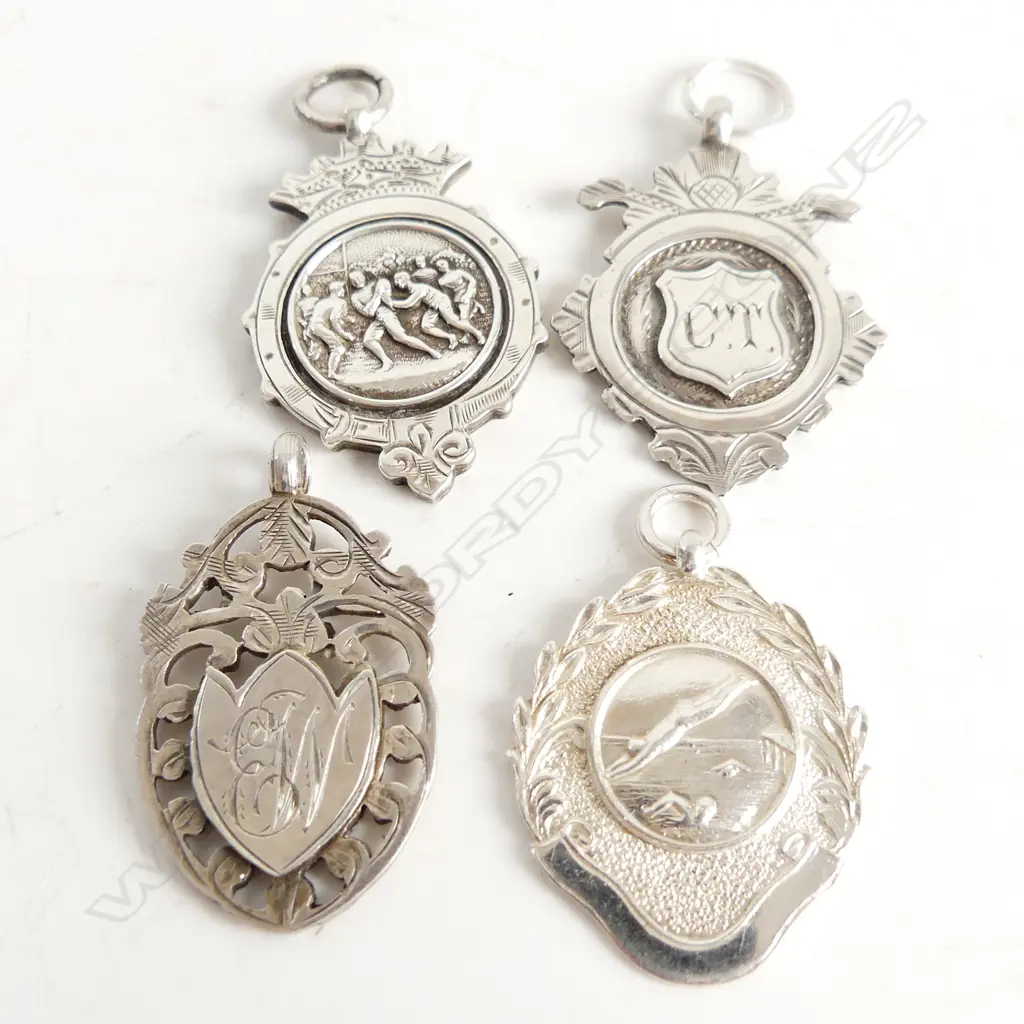 4 STG SILVER MEDALETTES 29 GRAMS Image 1++