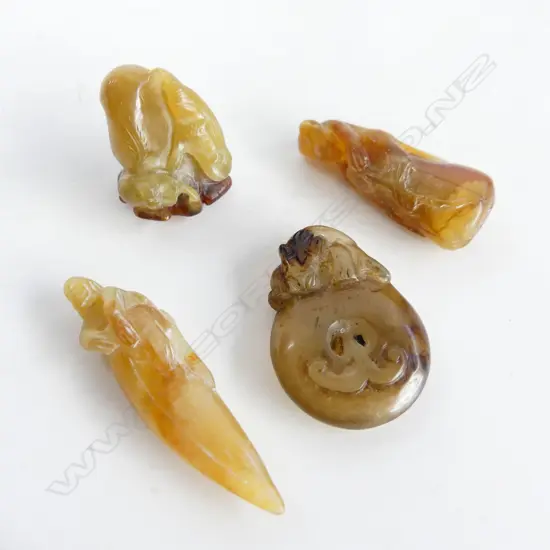 4 SMALL ORIENTAL JADE HANDLING PIECES