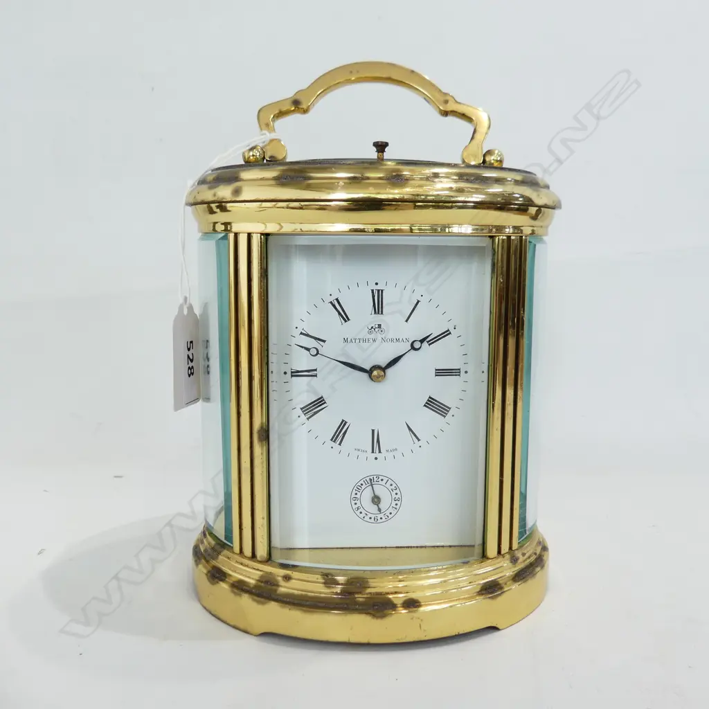 LG BRASS CARRIAGE CLOCK IN GLASS CSE BY MATTHEW NORMAN, MADE IN SWITZERLAND H. 190mm Image 1++