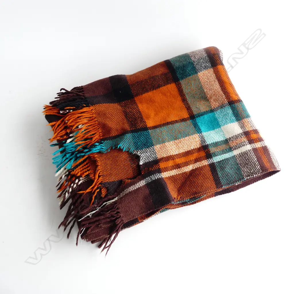 KAIAPOI 'HUIA' PURE WOOL TRAVEL RUG - SMALL HOLE  Image 1++