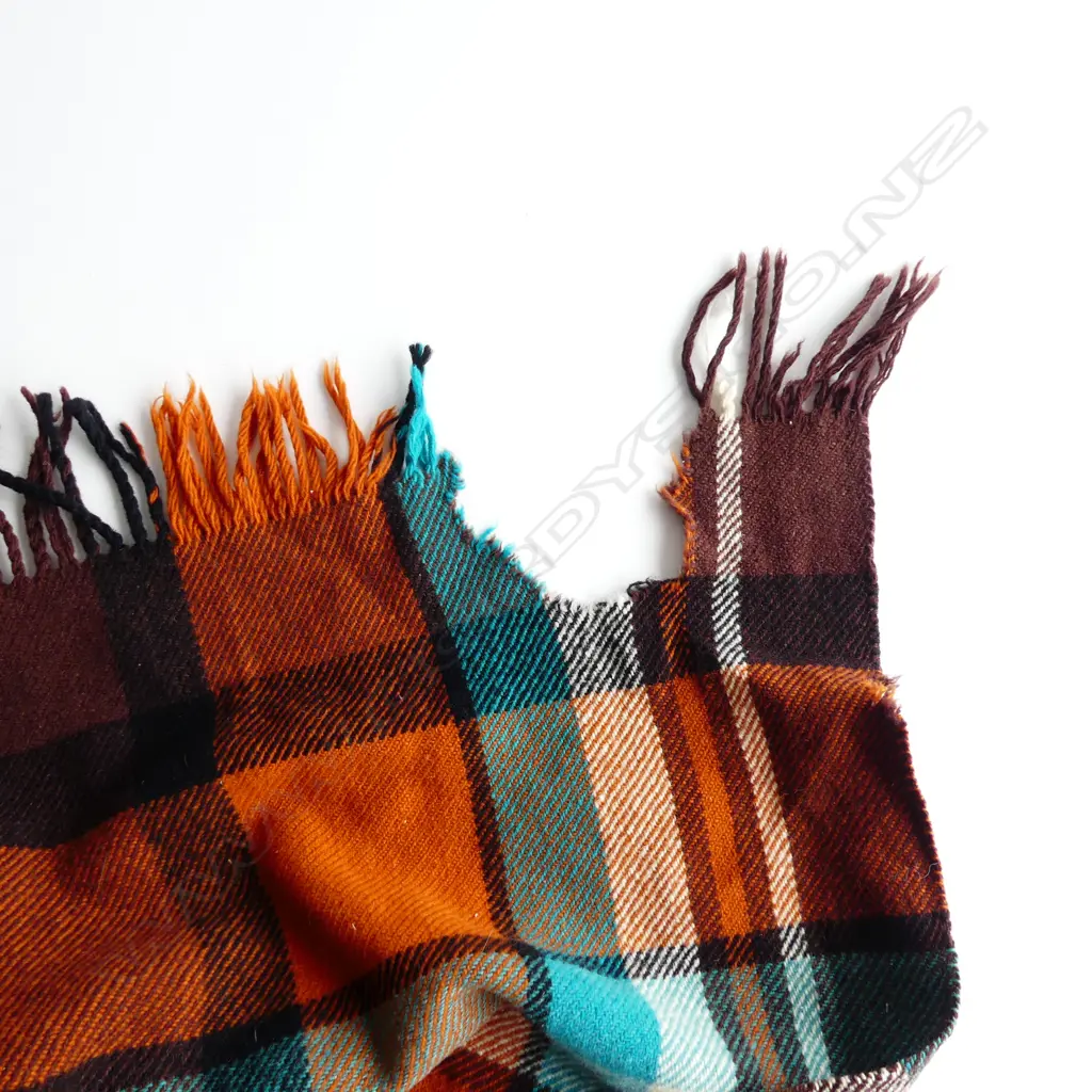 KAIAPOI 'HUIA' PURE WOOL TRAVEL RUG - SMALL HOLE  Image 1++