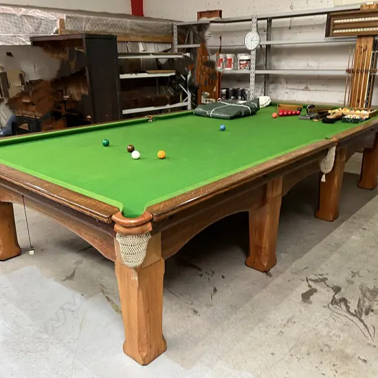 A FULL SIZED 100 YEAR-OLD SOLID OAK RILEY SNOOKER TABLE IN VERY GOOD CONDITION....