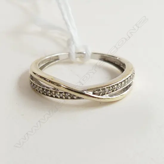 9CT WHITE GOLD DIAMOND CROSS OVER RING 1.5 GRAMS w. 2023 VALUATION