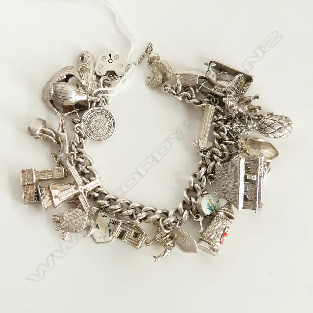 SILVER CHARM BRACELET LOADED WITH VARIOUS CHARMS 112gms Image 1++