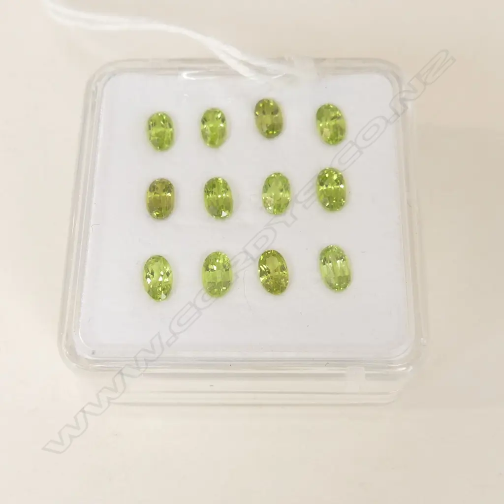PERIDOT OVALS 5X3 12 = 3.80CT Image 1++