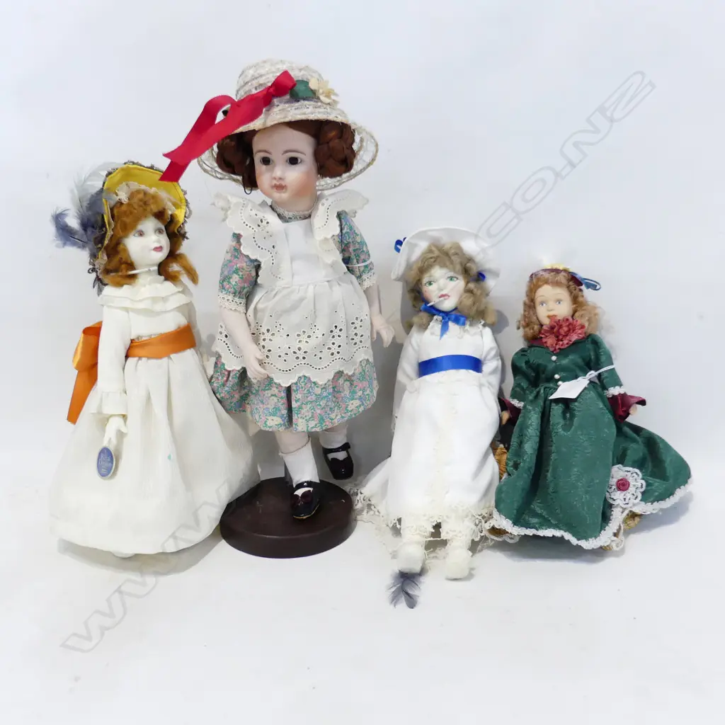 4 MODERN  PORCELAIN HEADED DOLLS.  Image 1++