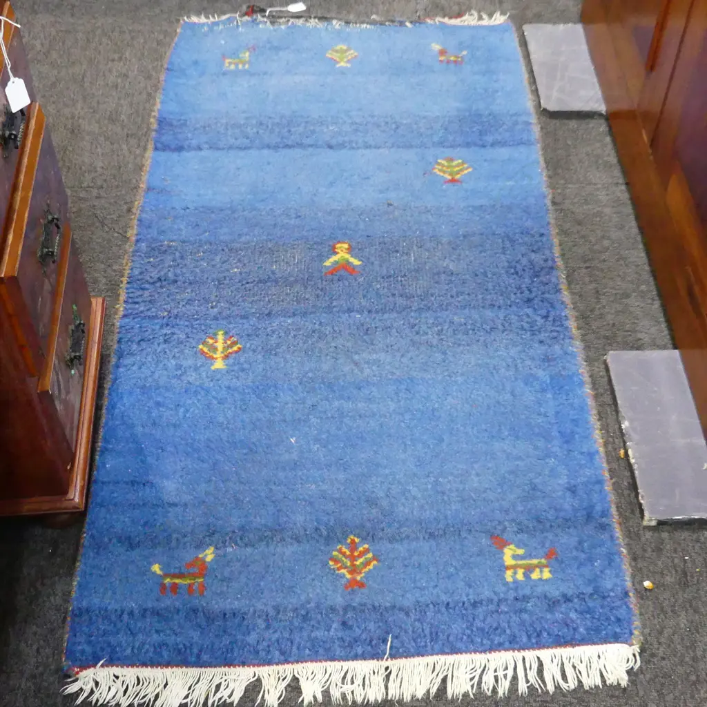 SMALL BLUE GABBEH RUG END NEEDS REBINDING - WORN 1470x740mm Image 1++