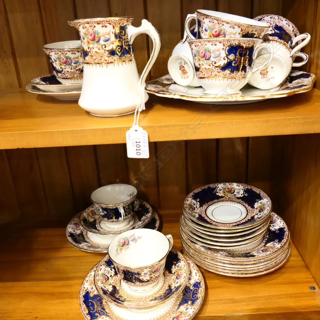 PORCELAIN 9 PLACE ENGLISH TEASET. CUPS SAUCERS PLATES JUG & CAKE PLATE.ONE CUP HANDLE GLUED.  Image 1++