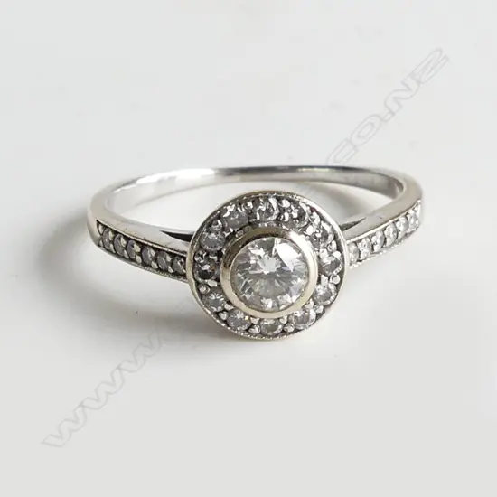 18CT WHITE GOLD AND DIAMOND RING TDW 0.50ct (with valuation)