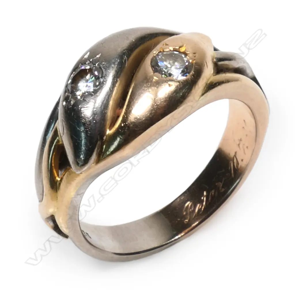 A 14ct yellow and white gold and 2 diamond snake ring Image 1++