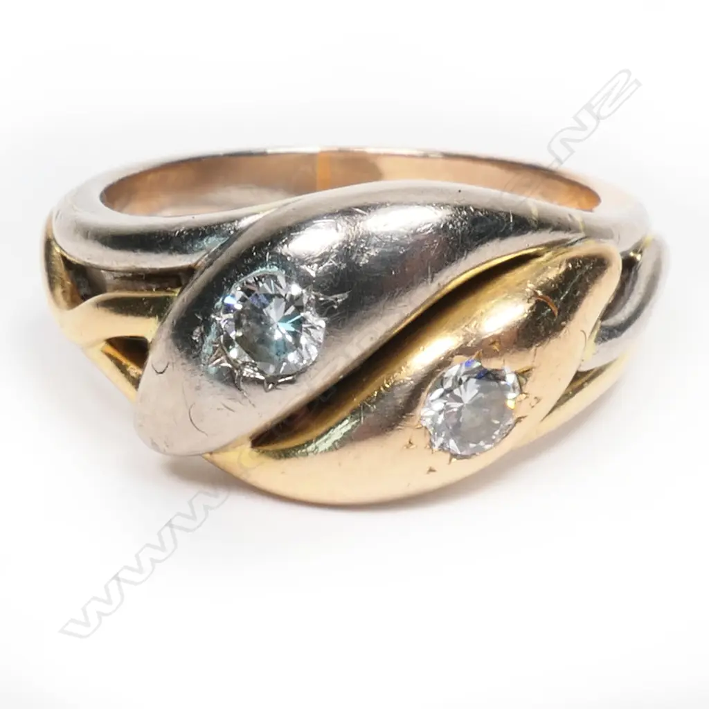 A 14ct yellow and white gold and 2 diamond snake ring Image 1++
