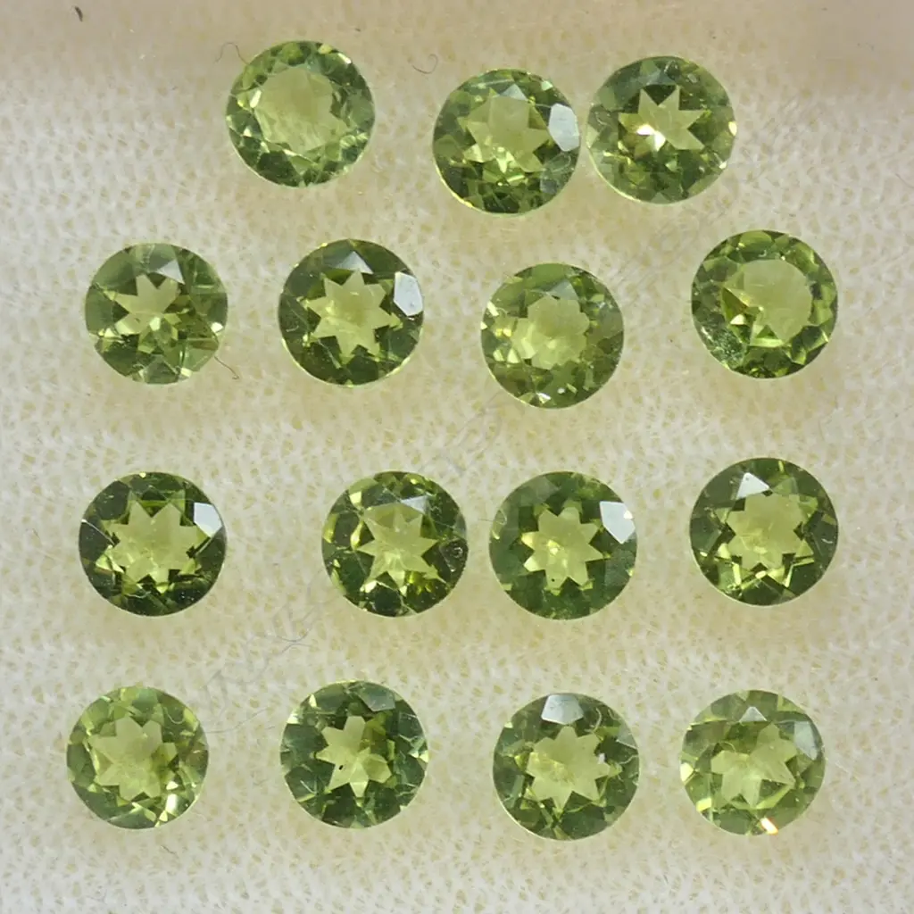 PERIDOT 5MM ROUND  15 = 6.58CT Image 1++