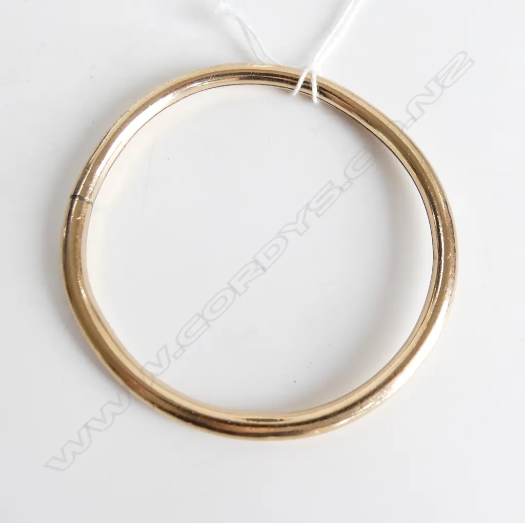 9ct GOLD PLATED LRG BANGLE, SLIGHTLY BENT Image 1++
