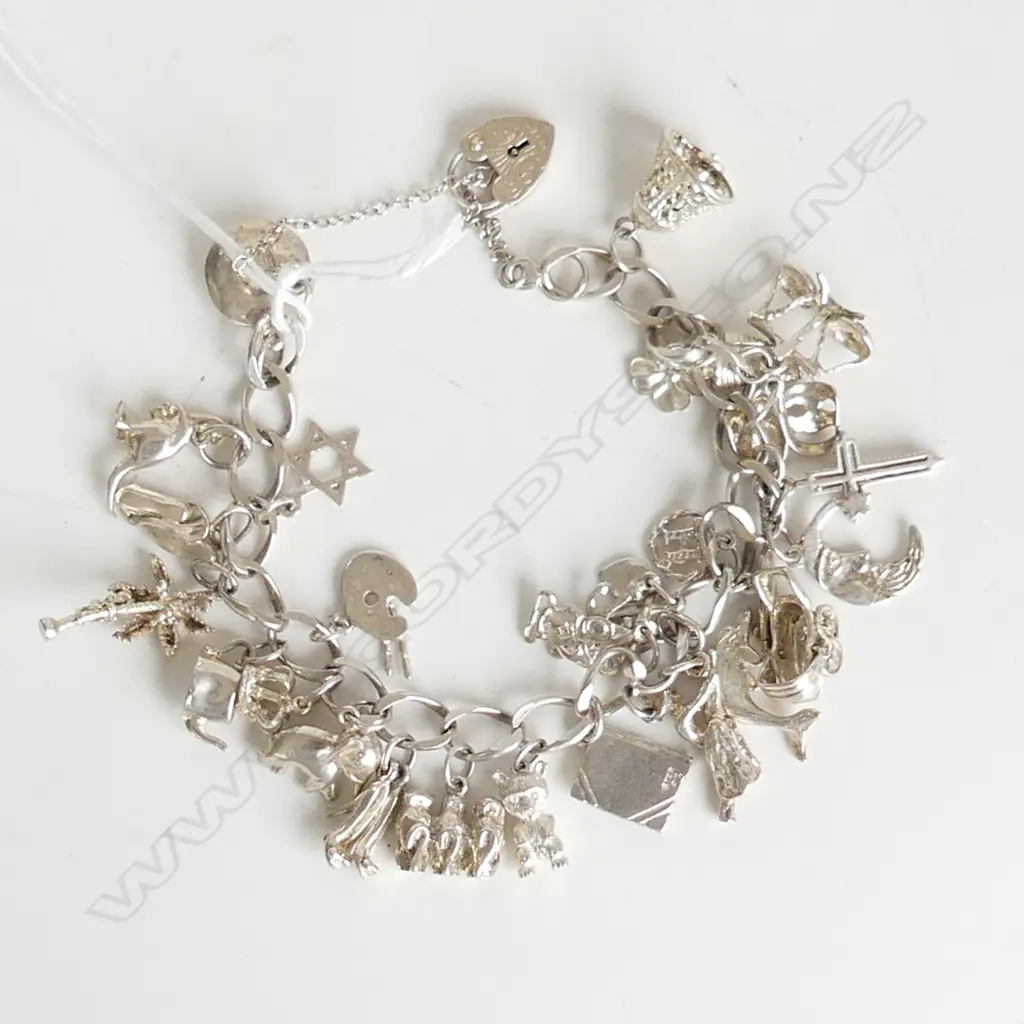ST SILVER CHARM BRACELET, 27 CHARMS Image 1++