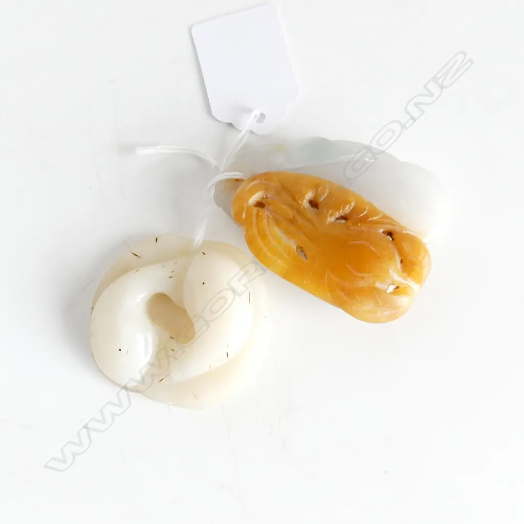 TWO JADE PENDANTS OR HANDLING PIECES Image 1++