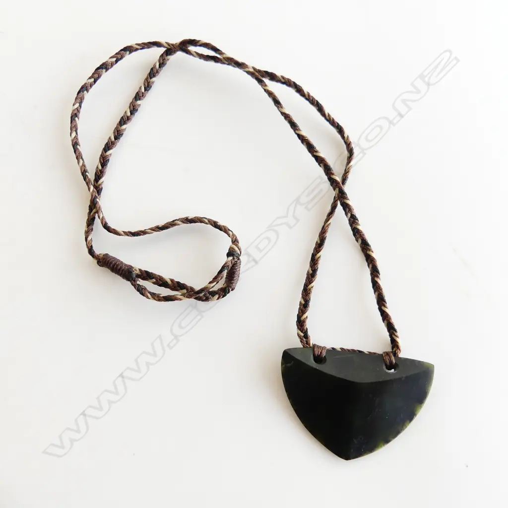 Carved pounamu (gem Obsidian) Niho mango (shark tooth) pendant. L 55m Image 1++