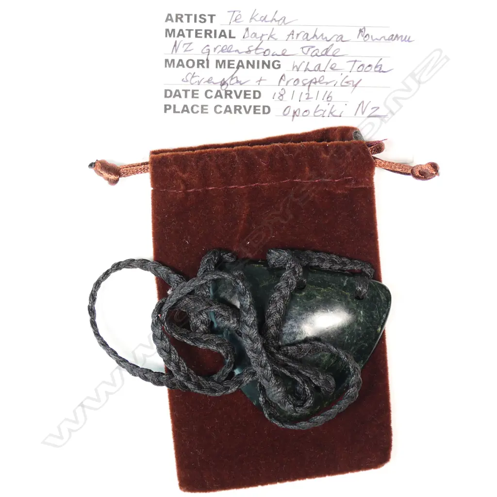 TE KAHA carved (dark arahura) pounamu lge notched triangular form pendant with certificate 2016. W.63mm. Image 1++
