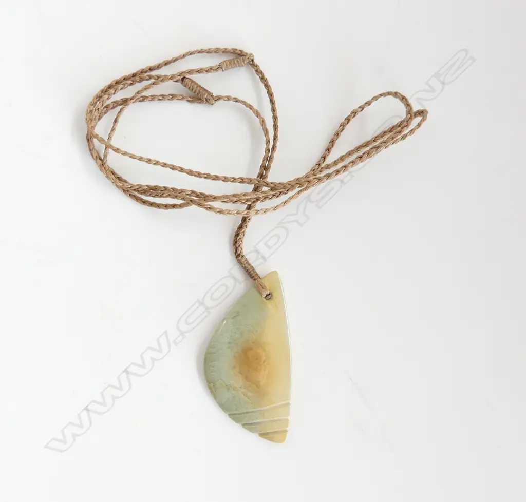 KURTIS BELL carved pounamu (gem inanga flower) treasure of the sea pendant with certificate 2019. L 55m Image 1++