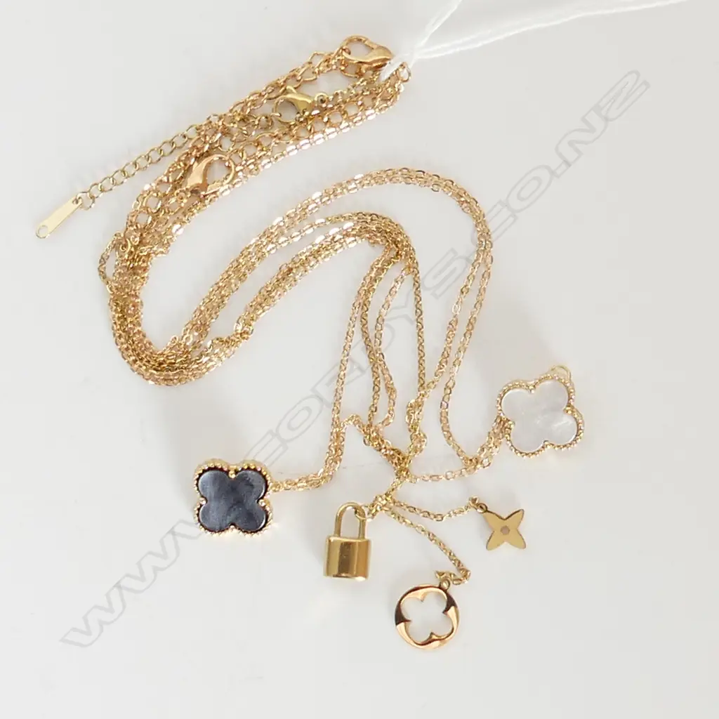 3 GOLD TONE FASHION NECKLACES, 2 W CLOVERS, 1 W CHARMS Image 1++