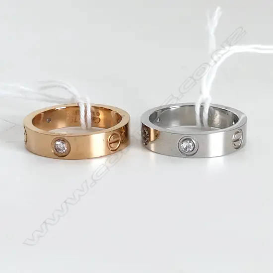 2 FASHION LOVE RINGS, GOLD & SILVER TONE IN BOXES