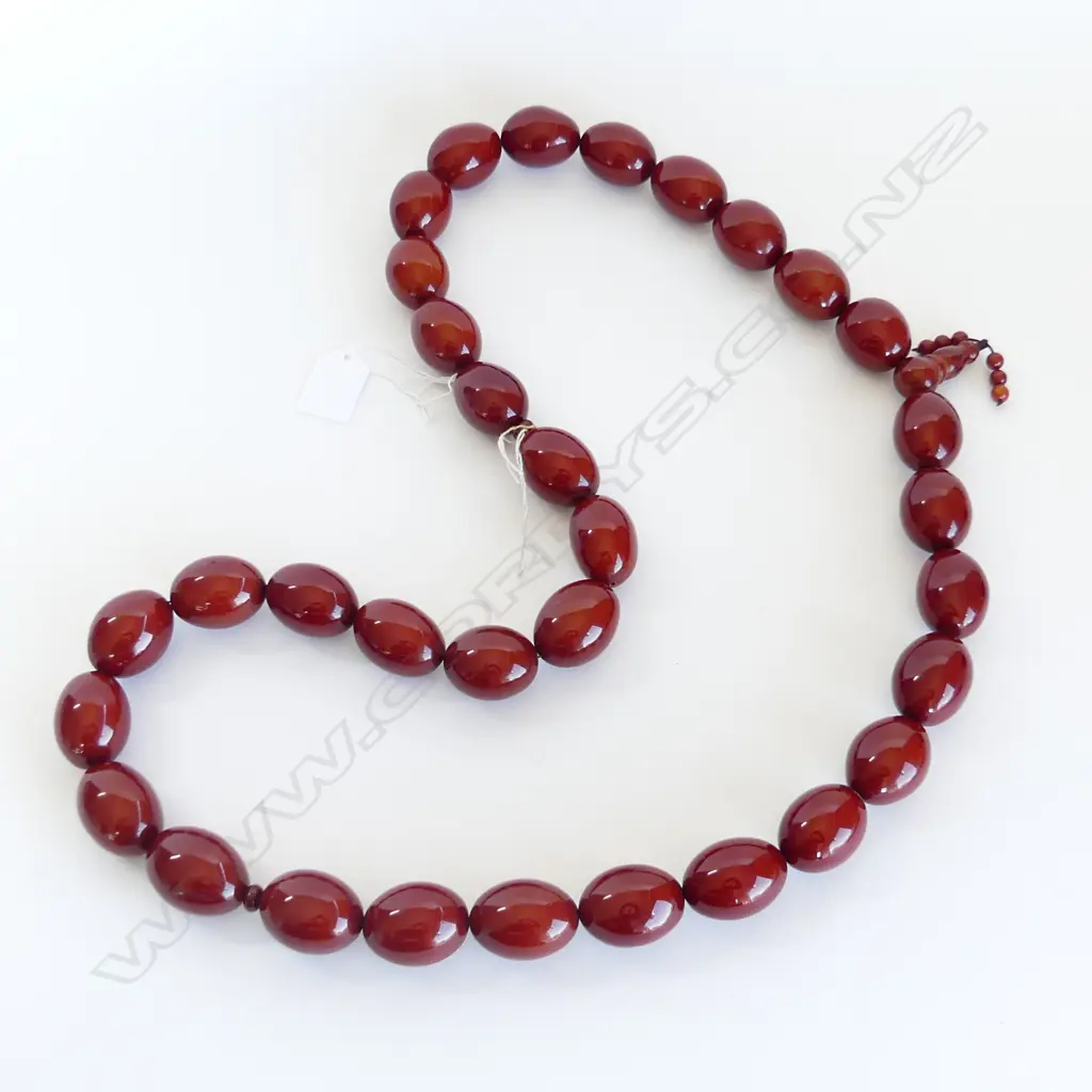 STRAND X LARGE AMBER COLOURED BEADS, 671GMS  Image 1++
